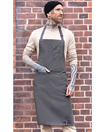 Delantal de Peto estilo Denim Bistro ROCK CHEF®. 65% Poliéster - 35% Algodón. 195 g/m²